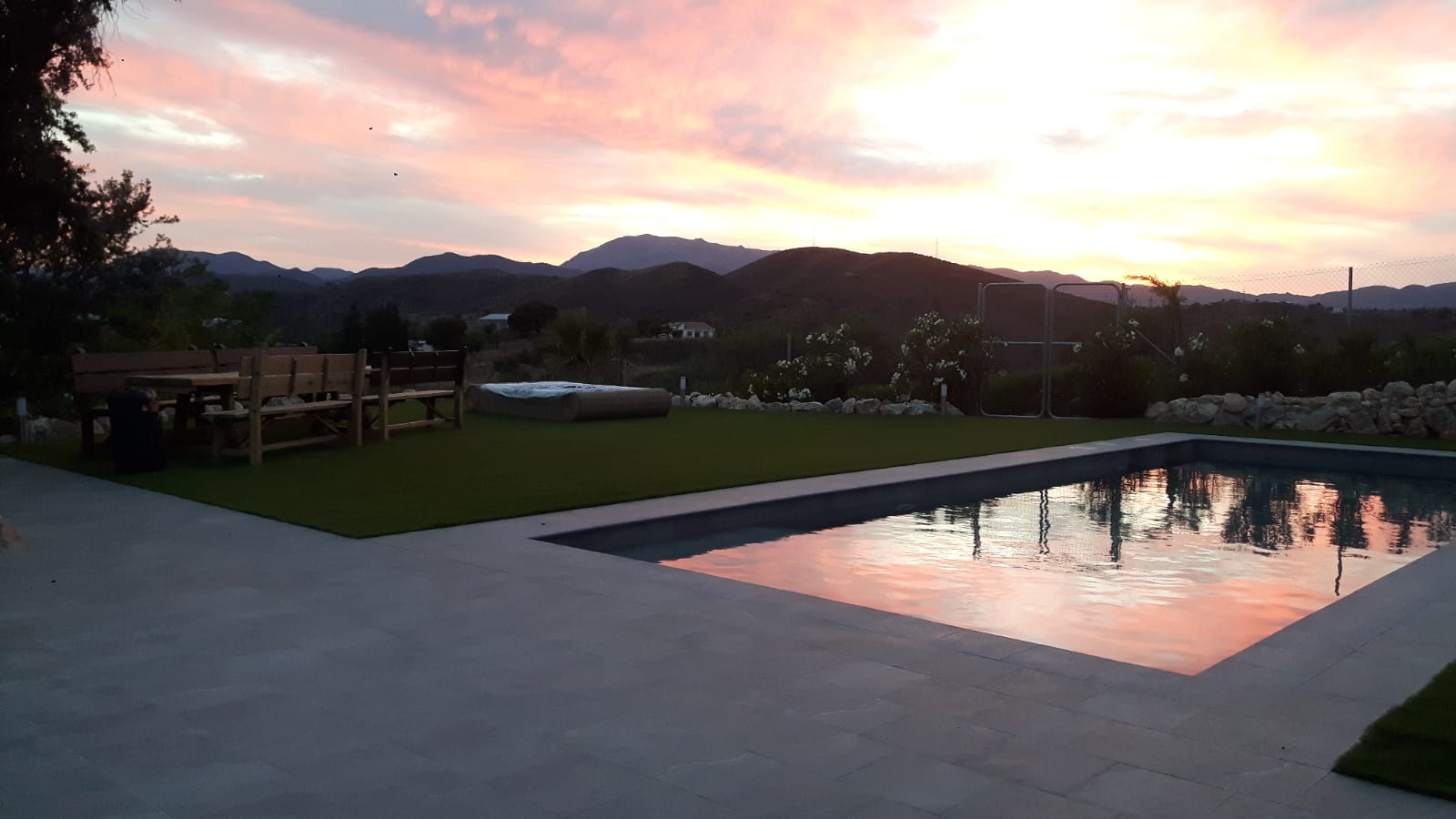 Evening atmosphere with pool lighting at luxury finca near Marbella